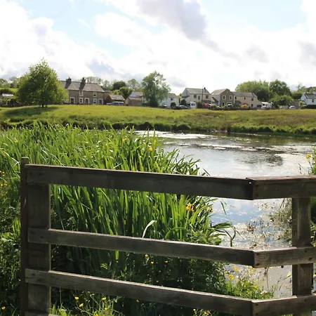 Greenside Traditional Overlooking Caldbecks Duck Pond